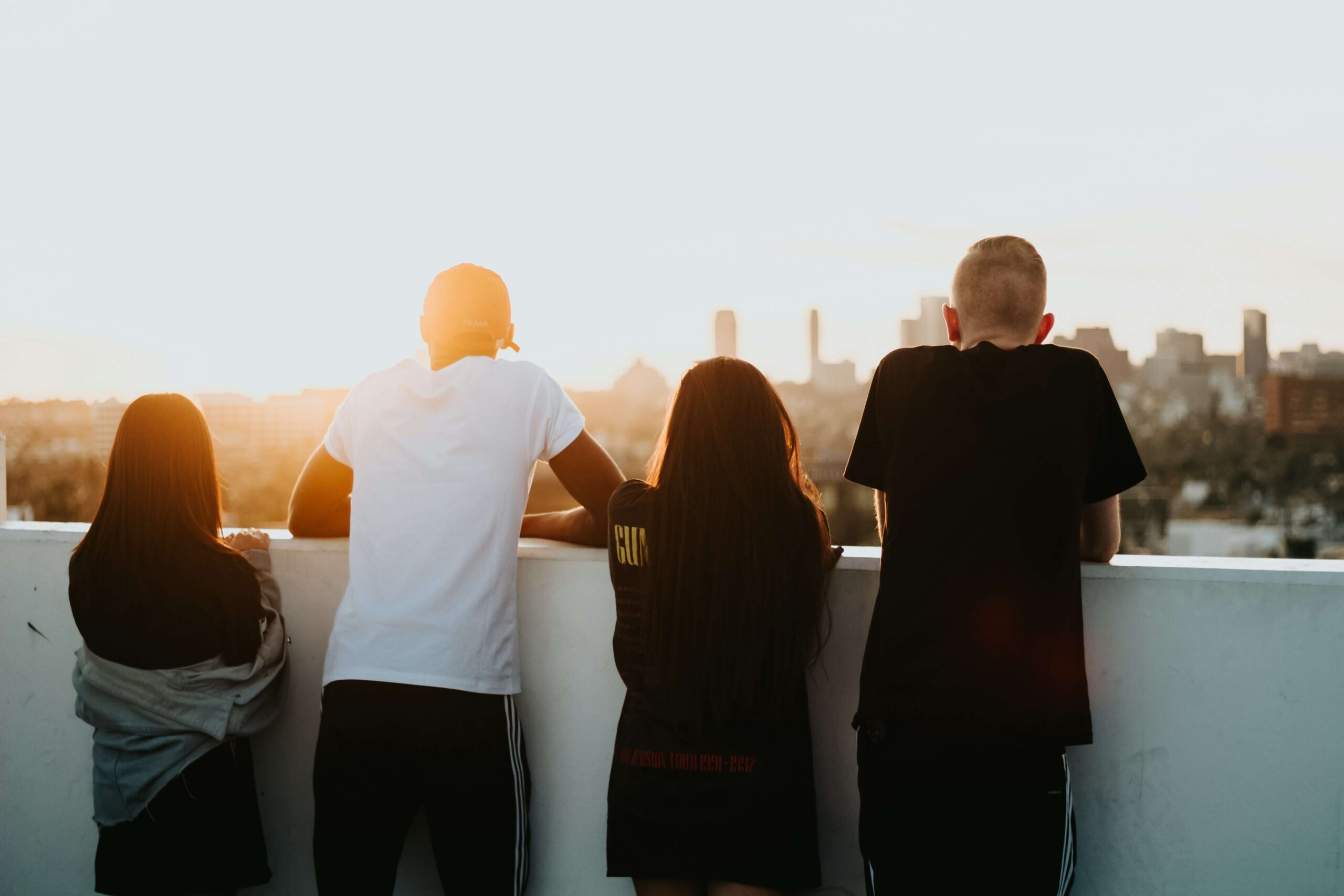 People overlooking a bridge